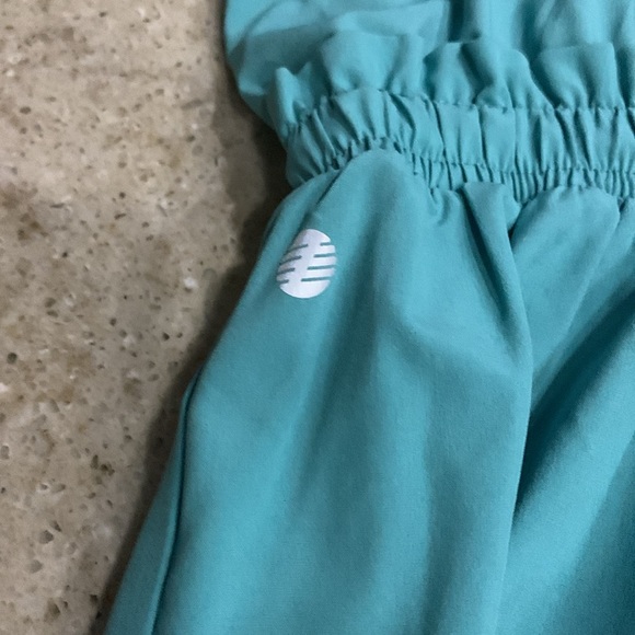 NWOT Z by Zella Girl Sleeveless Ruffle Waist Romper in Teal Lagoon Size 7 - Picture 5 of 10